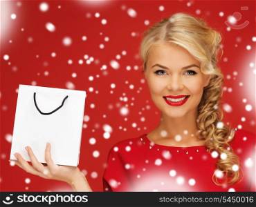 picture of lovely woman in red dress with shopping bag