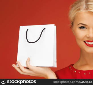 picture of lovely woman in red dress with shopping bag