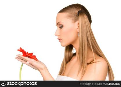 picture of lovely woman in towel with red flower