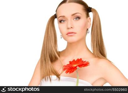 picture of lovely woman in towel with red flower