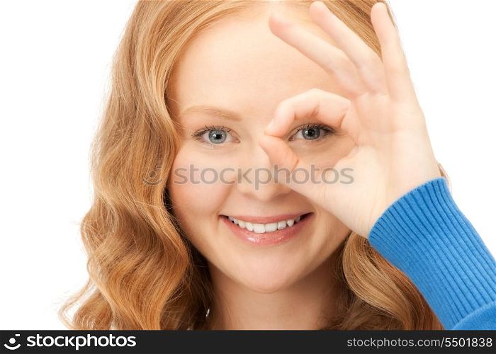 picture of lovely woman looking through hole from fingers&#xA;