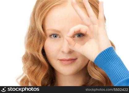 picture of lovely woman looking through hole from fingers&#xA;