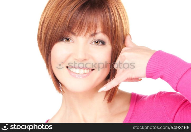 picture of lovely woman making a call me gesture