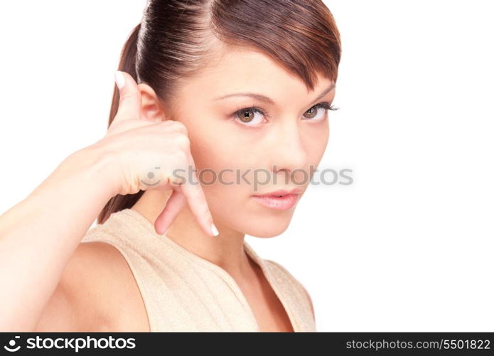 picture of lovely woman making a call me gesture