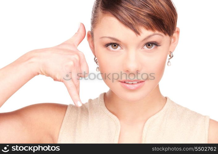 picture of lovely woman making a call me gesture