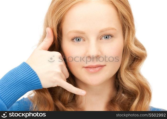 picture of lovely woman making a call me gesture&#xA;