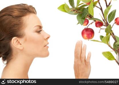 picture of lovely woman with apple twig