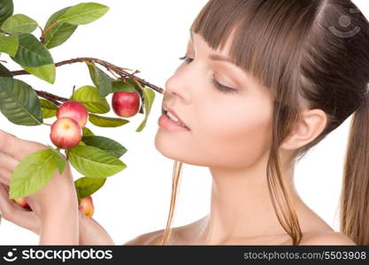 picture of lovely woman with apple twig