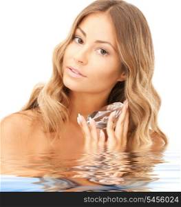 picture of lovely woman with big diamond in water