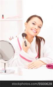 picture of lovely woman with brush and mirror