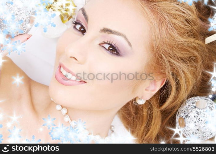 picture of lovely woman with christmas balls