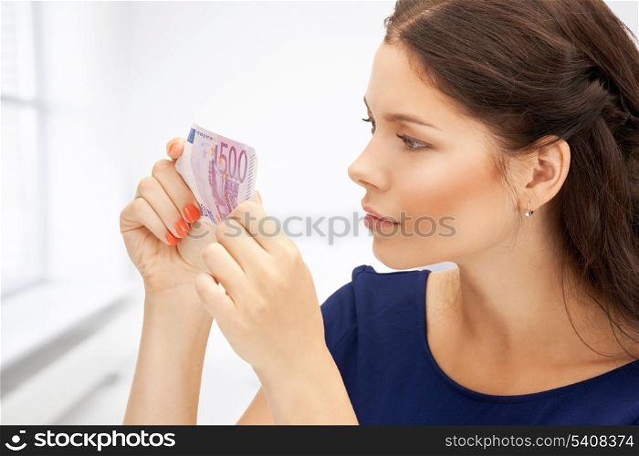 picture of lovely woman with euro cash money