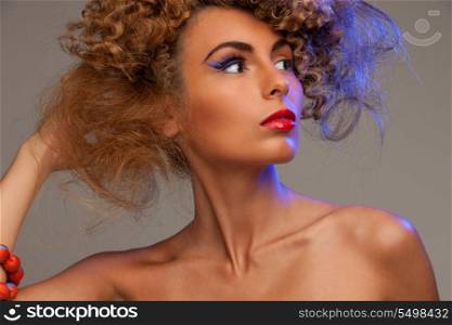 picture of lovely woman with fashionable hair over grey