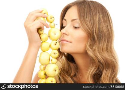 picture of lovely woman with green apples over white&#xA;