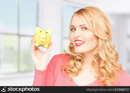 picture of lovely woman with piggy bank