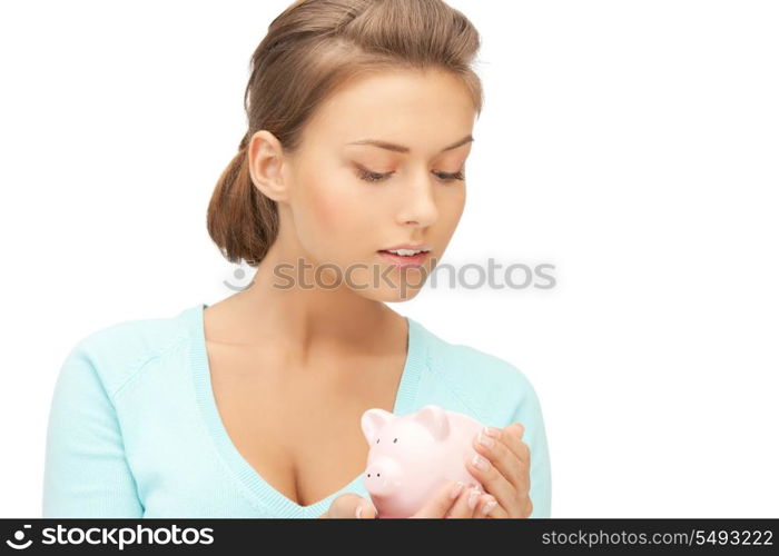 picture of lovely woman with piggy bank