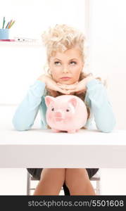 picture of lovely woman with piggy bank