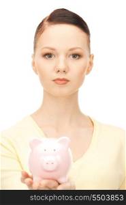 picture of lovely woman with piggy bank