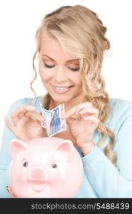 picture of lovely woman with piggy bank and money