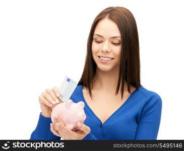 picture of lovely woman with piggy bank and money.