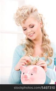 picture of lovely woman with piggy bank and money