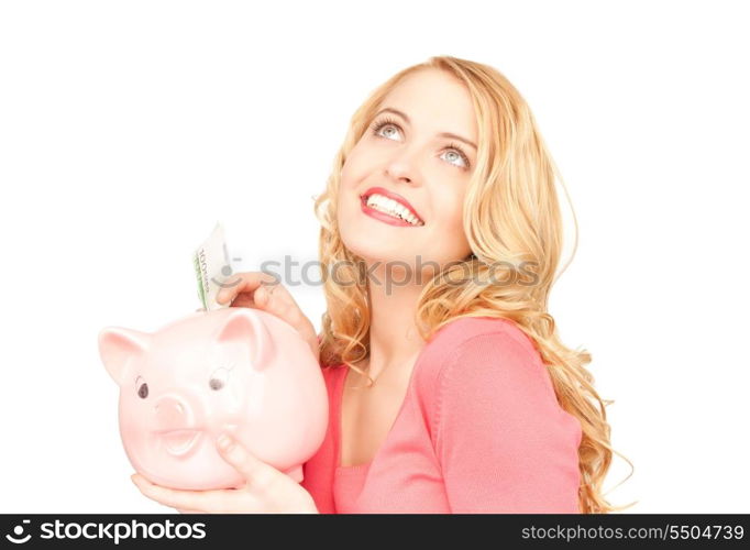 picture of lovely woman with piggy bank and money