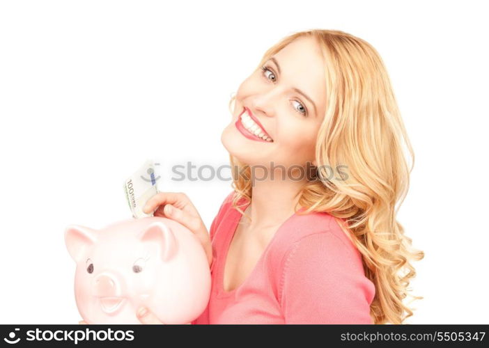 picture of lovely woman with piggy bank and money