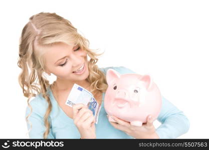 picture of lovely woman with piggy bank and money