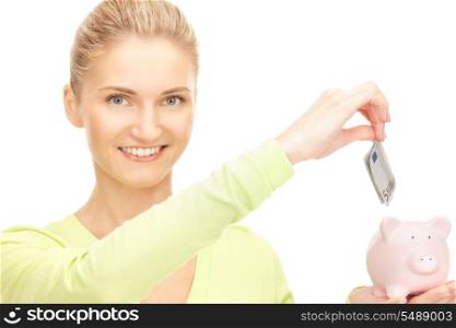 picture of lovely woman with piggy bank and money&#xA;