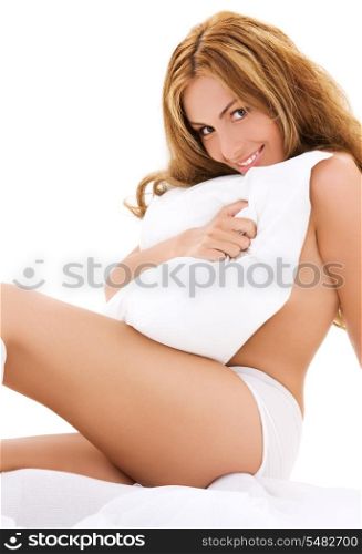picture of lovely woman with pillow in bed