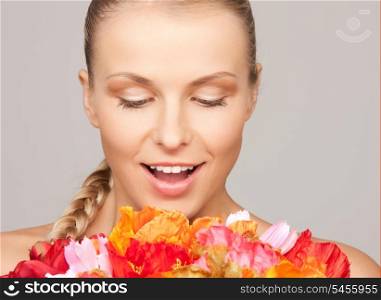 picture of lovely woman with red flowers