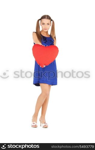 picture of lovely woman with red heart-shaped pillow