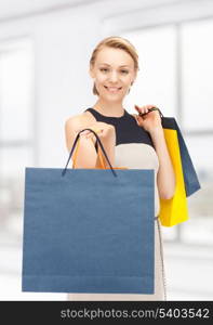 picture of lovely woman with shopping bags