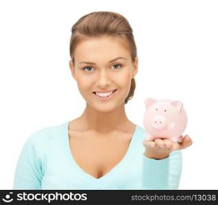 picture of lovely woman with small piggy bank