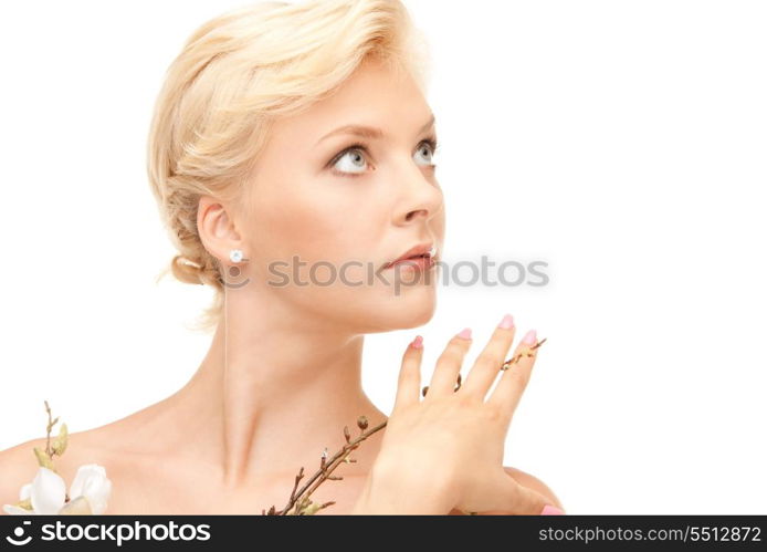 picture of lovely woman with twig over white