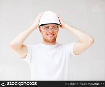 picture of male architect in helmet with safety glasses