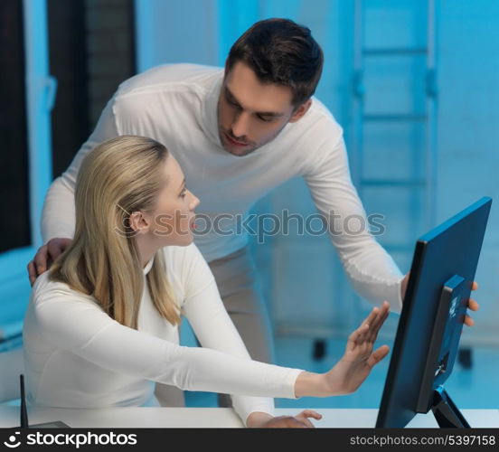 picture of man and woman in space laboratory