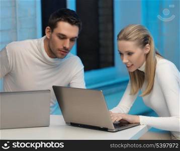 picture of man and woman in space laboratory