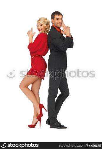picture of man and woman making a gun gesture
