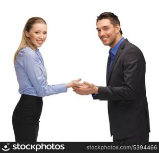 picture of man and woman showing something on the palms.