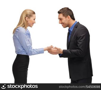 picture of man and woman showing something on the palms.