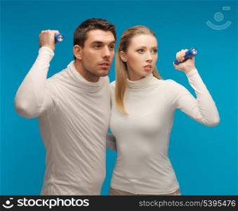 picture of man and woman with pocket flashlights