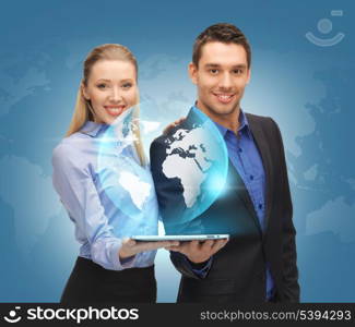 picture of man and woman with tablet pc and virtual globe.