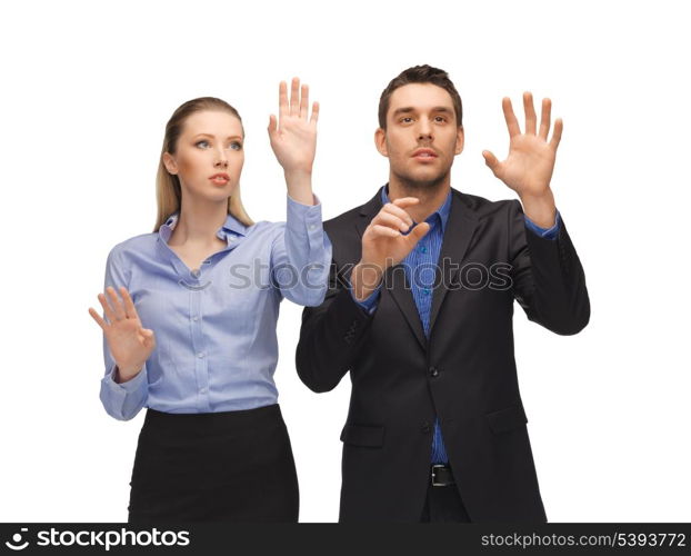 picture of man and woman working with something imaginary.