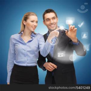 picture of man and woman working with virtual screen