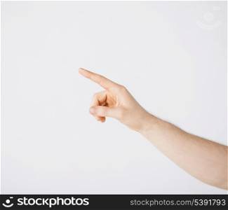 picture of man hand pointing at something