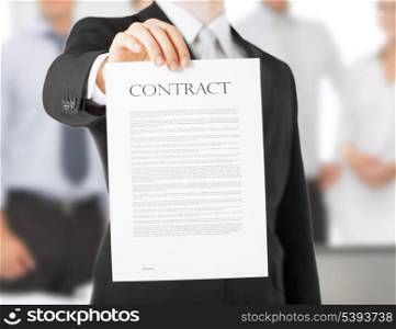 picture of man hands holding contract with random text