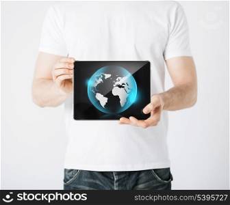 picture of man hands holding tablet pc with sign of globe