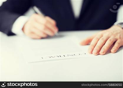 picture of man hands signing contract