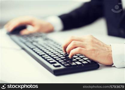picture of man hands typing on keyboard